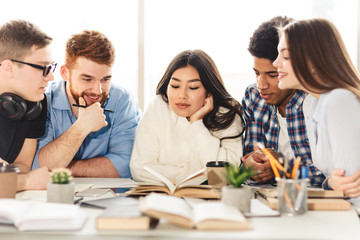 Learning concept. Multinational students preparing to exam