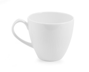 white ceramic cup on white background