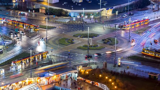 timelapse of aerial view of busy trafic at Dmowski roundabout during dusk, Warsaw, Poland
