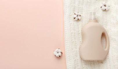 Plastic packaging with washing conditioner, towels and cotton flowers