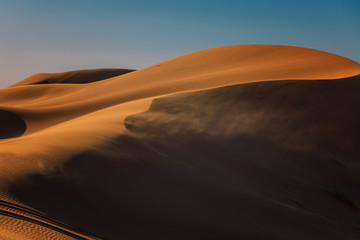 Desert Sands Landscape of Merzouga, Sahara. The wind drives the sand.