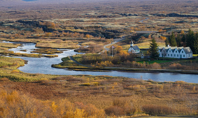 small village and old church with stream near Thingvellir national park, Iceland