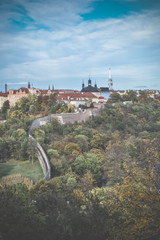 Autumn view of greenery and part of Prague from Vysehrad in Czech Republic