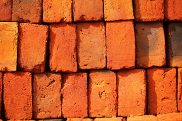 Fototapeta premium Red brick in the earthen canal during construction tropical.