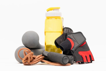 Fitness gym accessories isolated on the white background.