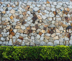 Natural stone masonry wall texture or background