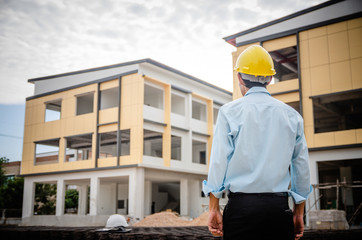 construction engineer standing at construction site