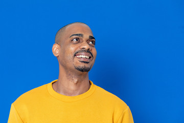 African guy with a yellow jersey