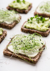 Focus on sandwich with tofu and microgreen