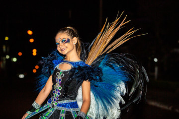 Brazilian teen wearing Samba Costume. Beautiful Brazilian kid woman wearing colorful costume and...