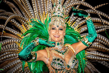Brazilian wearing Samba Costume. Beautiful Brazilian woman wearing colorful costume and smiling...