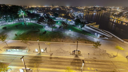 Jardim do Morro in Vila Nova de Gaia and Porto cityscape night timelapse in Portugal, historic city...