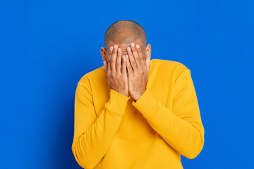 African guy with a yellow jersey