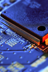 Electronic circuit board close up.