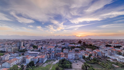 Rooftops of Porto's old town on a warm spring day timelapse sunset, Porto, Portugal