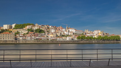 Fototapeta na wymiar View of the Douro River from embankment timelapse in Porto, Portugal.