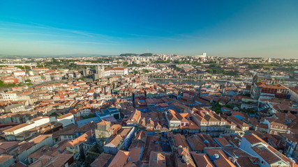 Fototapeta na wymiar Red roofs of city centre - view from Clerigos Tower in Porto timelapse, Portugal