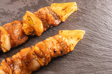 Barbecue on stone plate .