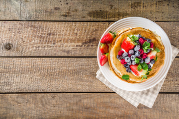 Sweet crepes with berries