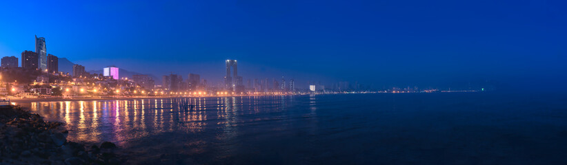 Obraz premium Benidorm, tourist city in Spain at dusk.