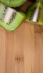 Kiwis on a wooden board