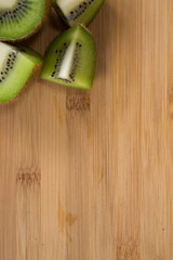 Kiwis on a wooden board