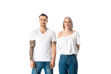 Fototapeta premium happy young tattooed couple isolated on white