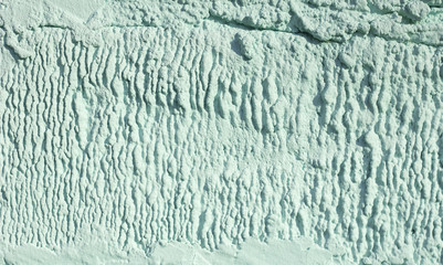 Aqua menthe textured background texture of cement wall, closeup