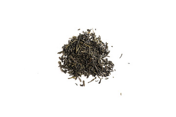 different sorts of black or green tea in bulk  on a white background close-up isolated