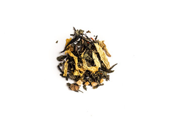 different sorts of black or green tea in bulk  on a white background close-up isolated