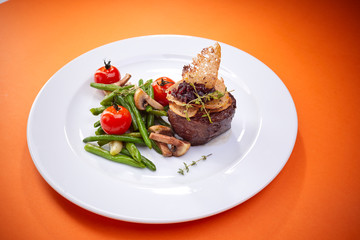 steak with vegetables, top view