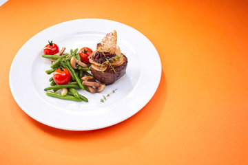 steak with vegetables, top view