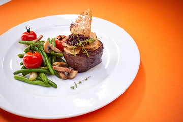 steak with vegetables, top view
