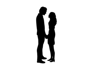 Silhouettes of lovers man and woman holding hands