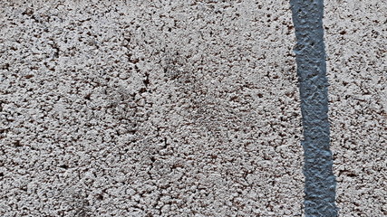 The surface of the wall is covered with rubble, with bricks as an abstract background, sepia dye stock images, Bight marble surface.