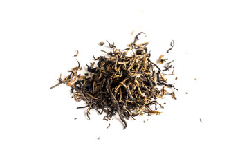 different sorts of black or green tea in bulk  on a white background close-up isolated