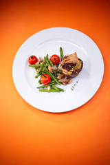 steak with vegetables, top view