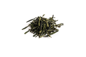 different sorts of black or green tea in bulk  on a white background close-up isolated