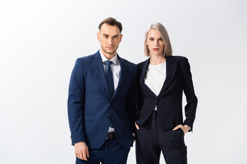 successful young tattooed businessman and businesswoman isolated on white