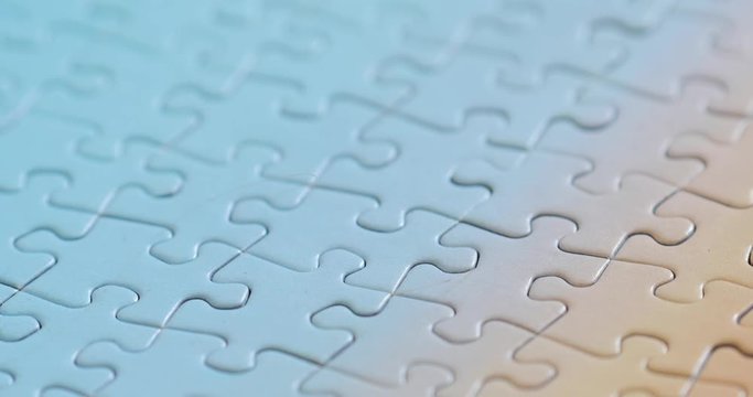 Completed jigsaw puzzle pattern, panning across the surface