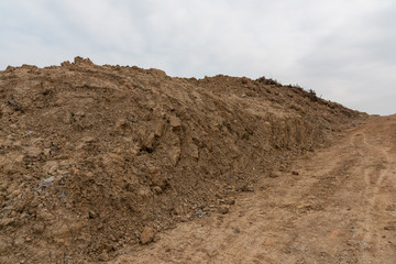 Dirt road and dirt mound