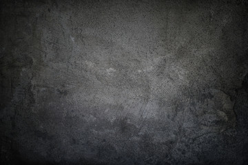Black grungy faded stucco, concrete and cement pattern, Textured Background.