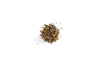 different sorts of black or green tea in bulk  on a white background close-up isolated