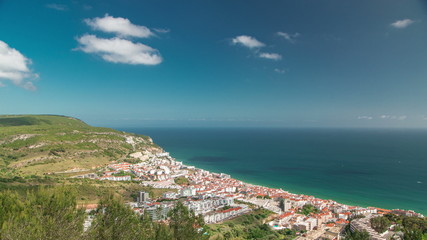 Fototapeta na wymiar Aerial view on the coastal town of Sesimbra in Portugal timelapse