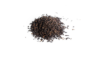 different sorts of black or green tea in bulk  on a white background close-up isolated