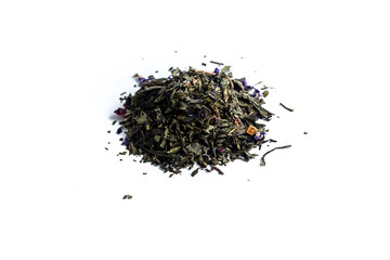 different sorts of black or green tea in bulk  on a white background close-up isolated