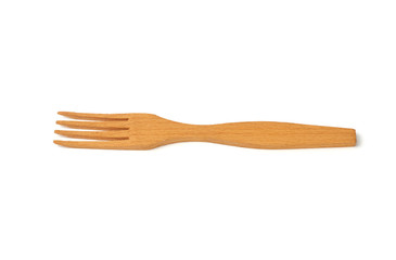 wooden yellow fork isolated on white background