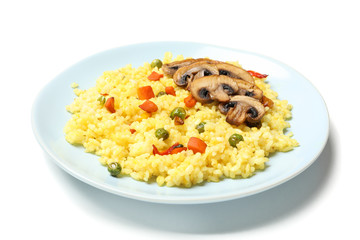Plate with delicious rice and mushrooms isolated on white background