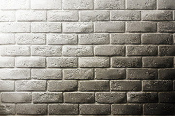 White brick wall, shadow and gradients, volume, from white to gray. Texture background for design and layouts