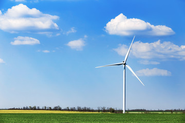 Wind turbine of blue sky with clouds background
